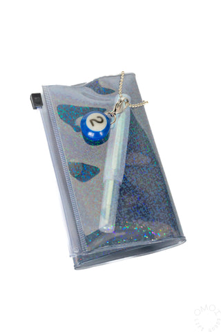 Black holographic 5 pocket pouch with pen inside clear pocket on a white background