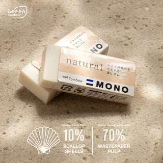 Tombow MONO natural eraser on a textured beige background