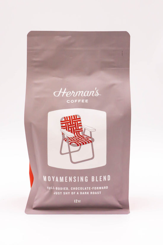Herman's Coffee Moyamensing Blend 12oz pouch, light brown with red logo graphic