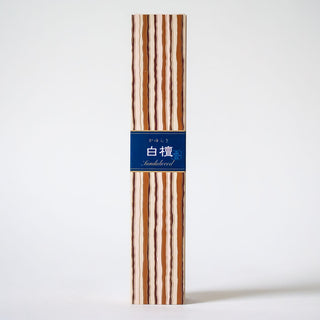 Sandalwood incense sticks with tall striped paper sleeve and blue label band