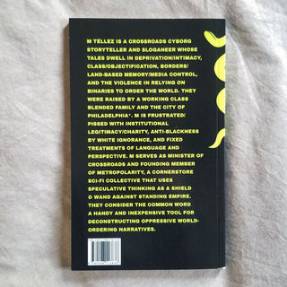 Black back cover with dense text block and barcode
