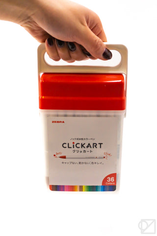 Retractable marker set in red-and-white Clickart holder, shown with 36 colors