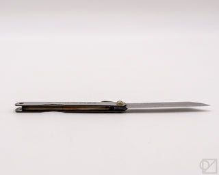 Pocket knife side profile with satin blade and black textured handle