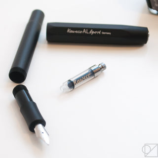 Kaweco Mini Converter with black housing, clear sac, and metal connector tip