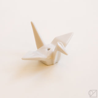 White origami crane incense burner figurine