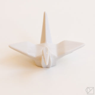 White origami crane incense burner figurine with wing details