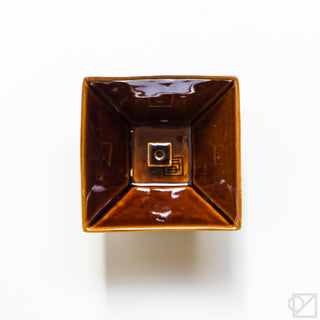 Glossy brown square incense burner with raised square emblem