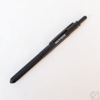 Matte black multi-pen with textured grip and side switch, angled view