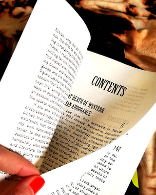 Open book showing “CONTENTS” heading and section listings