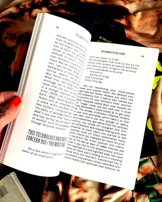 Open book pages with printed story text and page numbers